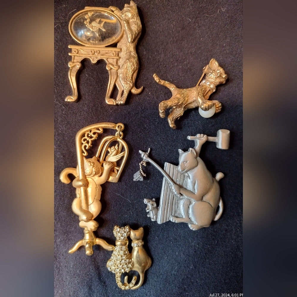 Cat brooches by 3 designers